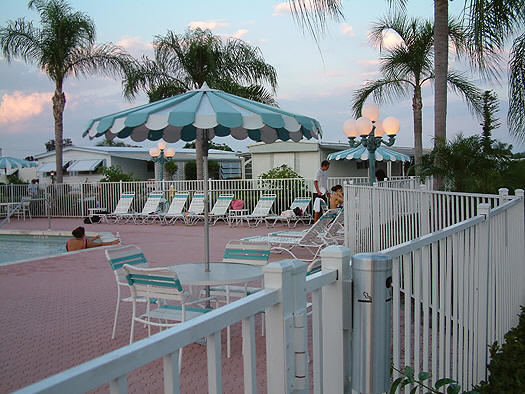 Pool area at Pinelake Village at dusk.